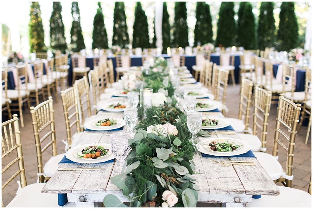 Farmhouse tables with draped greenery, navy and pink southern wedding | Ivan & Louise Images and Jessica Dum Wedding Coordination