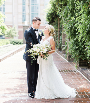 lace wedding dress; ivory bridal bouquet with greenery; Scottish Rite Cathedral Indianapolis Wedding; neutral floral and greenery wedding| Ivan & Louise Images and Jessica Dum Wedding Coordination